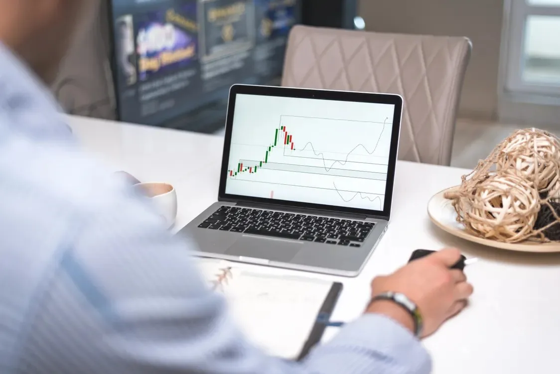 Financial data charts on a monitor closeup