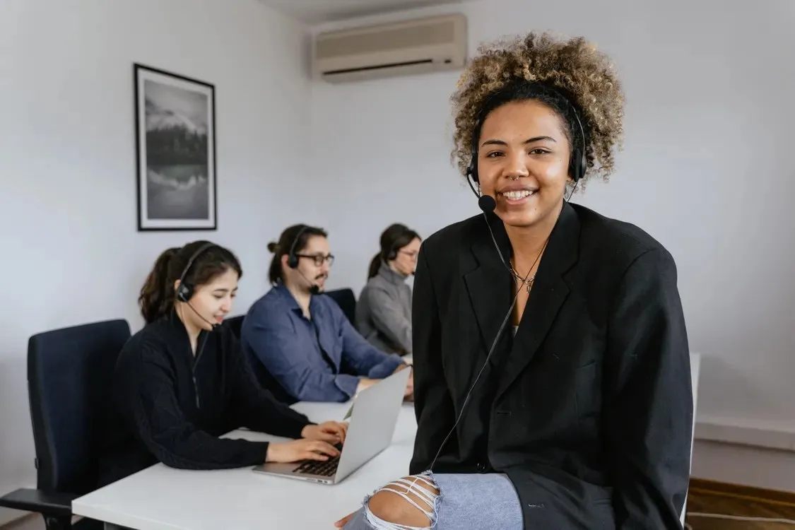 Sales team making phone calls in an office